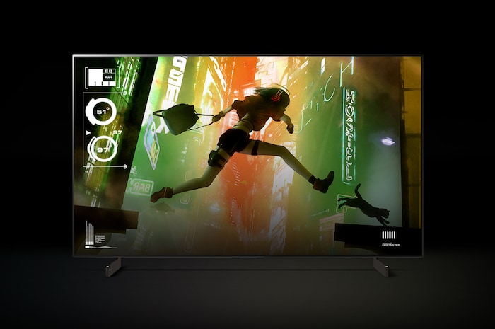 An LG C4 42 inch TV in a dark space on a two-pole stand shows colorful gameplay on the screen.