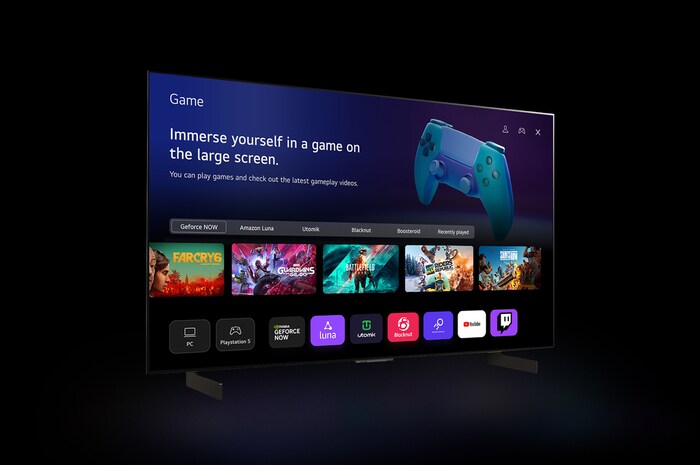 An LG C4 42 inch TV in a dark space on a two-pole stand shows the Quick Card menu on the screen.