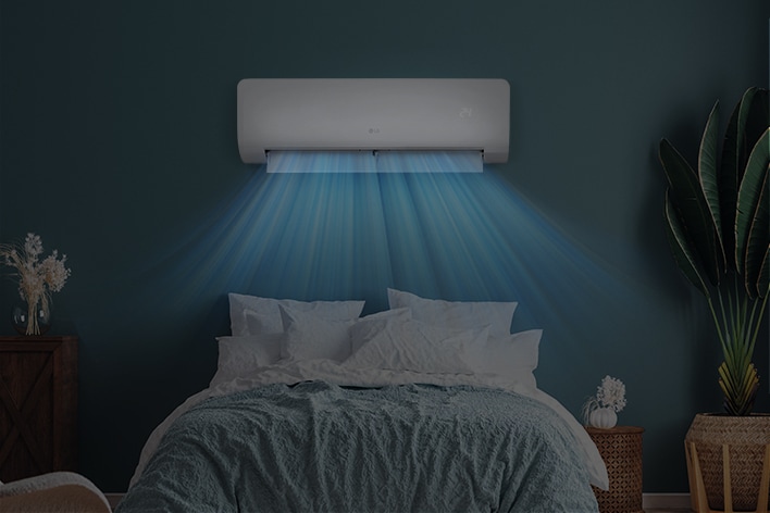 Vista del LED del aire acondicionado tenuemente iluminado en una habitación oscura.