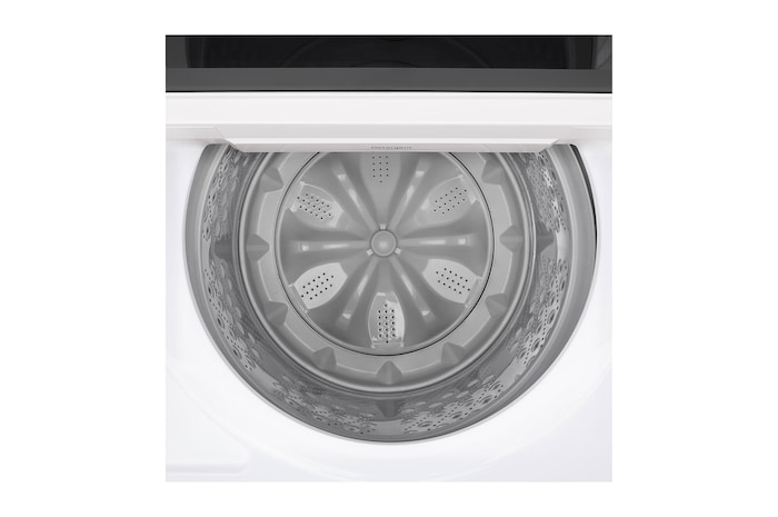 Top loading washing machine with lid in motion, showing soft closing door function.