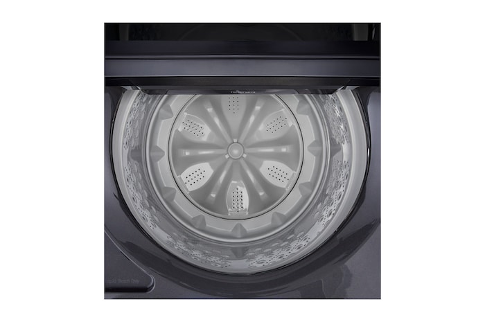 Top loading washing machine with lid in motion
