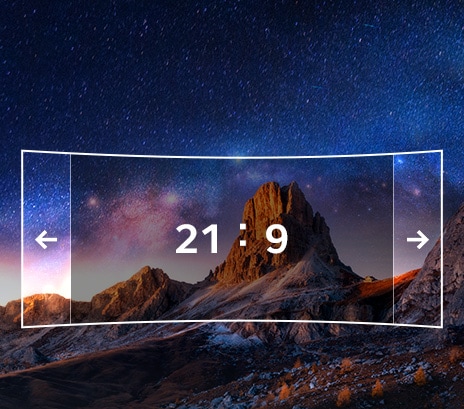 Uma imagem exibindo uma proporção de 21:9 é mostrada na tela do monitor com um fundo de paisagem natural.