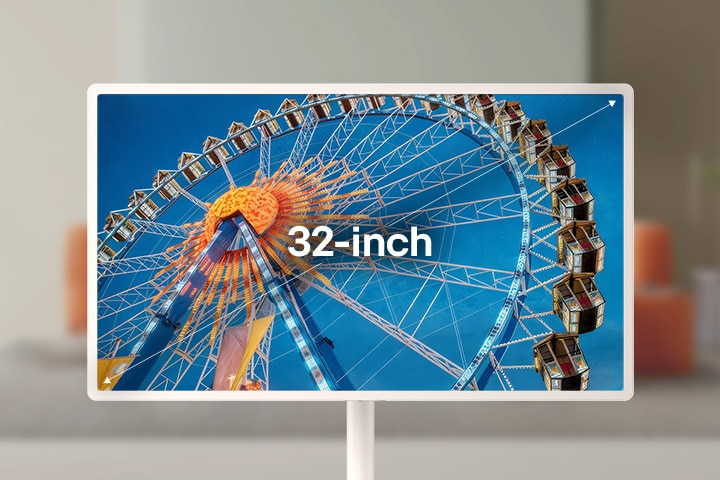 LG StanbyME 2 Max LX6 Movable Screen with a 32-inch screen shows a ferris wheel image, where the larger display enhances scale and visual clarity for a more immersive viewing experience in an indoor setting.