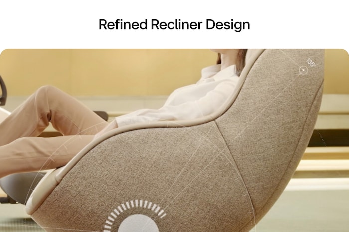 Close‑up side view of brown recliner’s refined upholstery and seamless ergonomic frame in a bright room.