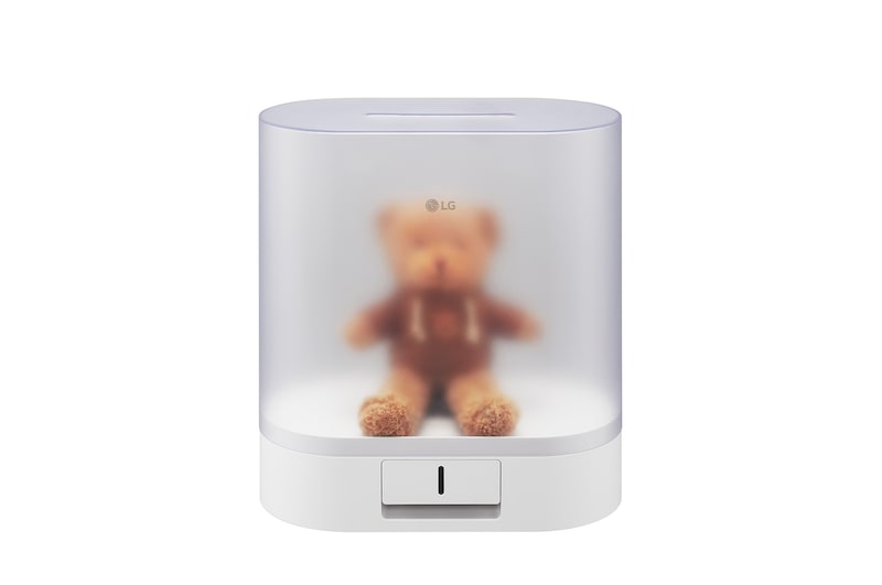 image of the Drying Case with its lid closed and a doll attached to the holder