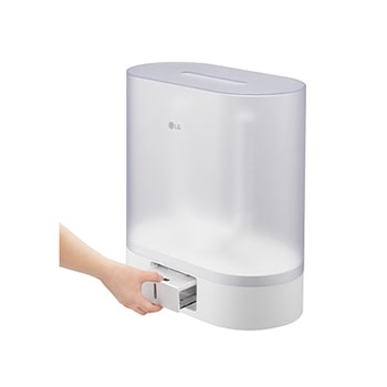 image of a hand removing the water tank from the bottom of the LG Dehumidifier Drying Case