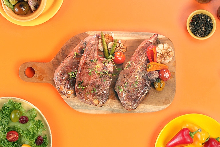 It shows a steak grilled by LG NeoChef™ 