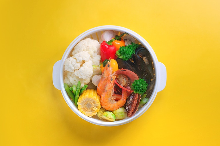 It shows steamed foods by LG NeoChef™ 