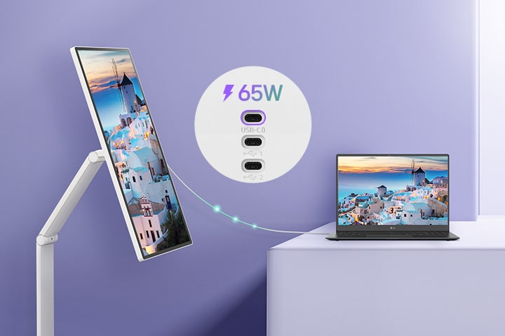 A laptop is connected to a LG Smart Monitor Swing via USB-C. It is charging through USB-C while displaying the same screen.