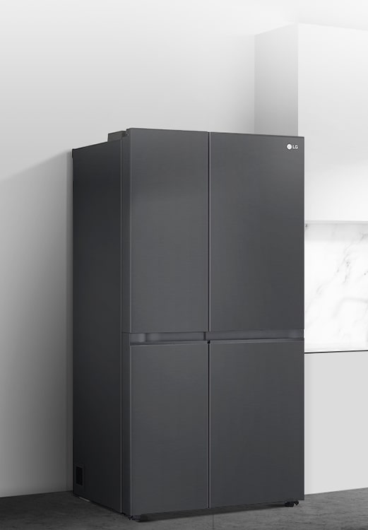 A side view of a kitchen with a black InstaView refrigerator installed.