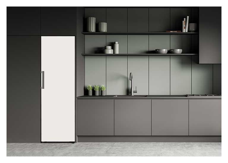 It shows beige color Larder placed in the kitchen