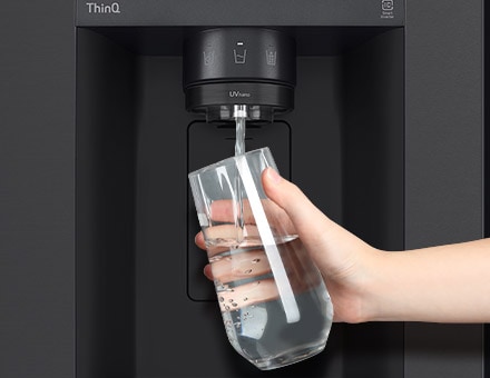 Getting water in a cup from a refrigerator water purifier