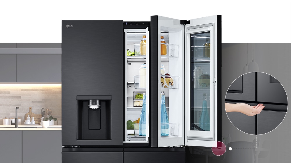 The front view of a Black Glass InstaView refrigerator. The door-in-door of the refrigerator is open. There's a small screen that explains where a concealed opening button is to open the door.
