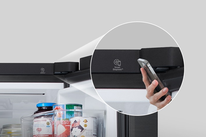 A person checking the refrigerator status using a smartphone with the lg smart diagnosis feature enabled.