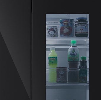 The lights on the instaview exterior of the lg french door refrigerator are turned on.