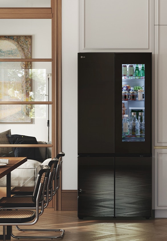 A modern classic kitchen reflected in the sleek design of the lg french door refrigerator with black mirror doors.