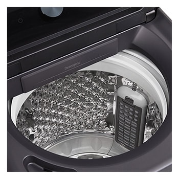 Woman unloading laundry from a Top load washing machine, featuring EasyUnload™