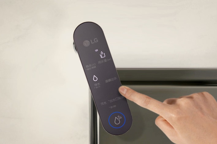 An image of a finger touching the control panel of the water purifier	