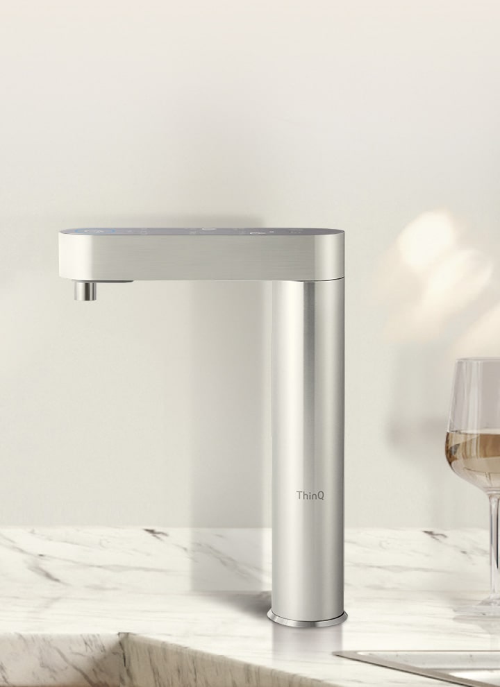A water purifier on a modern kitchen sink	