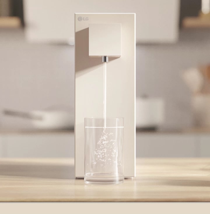 An LG water purifier that dispenses water into cups and bowls.