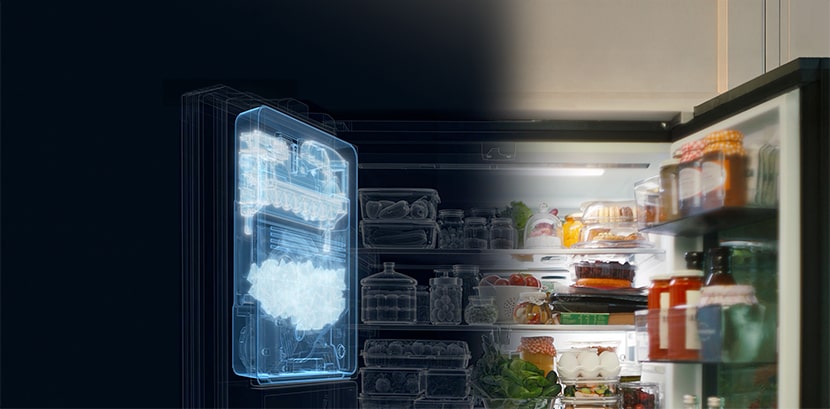 An open refrigerator with the Slim SpacePlus™ Ice System making ice.