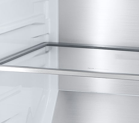 A diagonal view of the shelf with metallic paneling on the interior of the refrigerator.