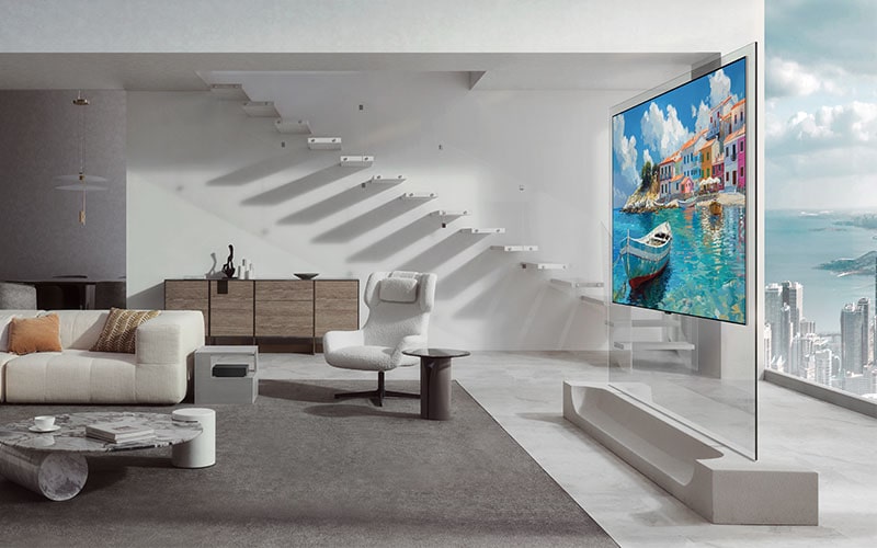 LG OLED evo AI W6 Wallpaper TV is placed in a modern living room as an Art TV, featuring a vibrant, colorful waterfront artwork and a slim profile that integrates smoothly into the sophisticated interior design of the space.