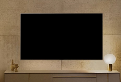 LG ART TV looks powered down on the wall, then Gallery Mode turns on, shows information, and cycles through different artworks.