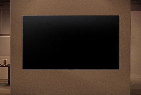LG ART TV is wall-mounted with the screen off, then turns on as a person approaches, using motion sensors to display an abstract swirling artwork.