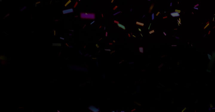LG TV for sports is visualized with colorful confetti flying across a dark background, creating a dynamic and energetic atmosphere with vibrant motion and layered bursts of color.