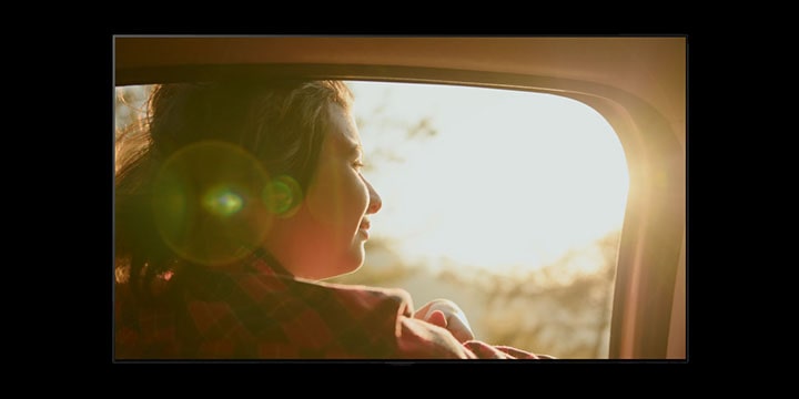 LG TV shows a drama scene of a person riding in a car, then a Sports Alert for a live soccer match pops up with real-time scores and, when tapped, switches straight to the live game.