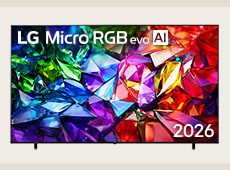 The front view of LG Micro RGB evo AI MRGB95, released in 2026, features a slim black bezel on low-profile feet, with a vivid, crystalline image of sharply defined red, green, and blue facets filling the screen.
