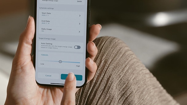 User setting target energy usage for an LG DUALCOOL AI Air conditioner with kW Manager