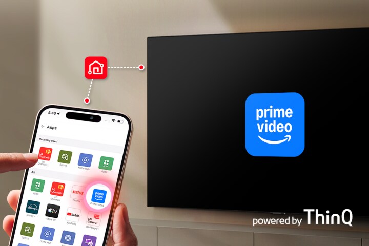 Person holding a smartphone with LG ThinQ app open in front of an LG Smart TV displaying the Prime Video logo, illustrating one-tap app launching from phone to TV.