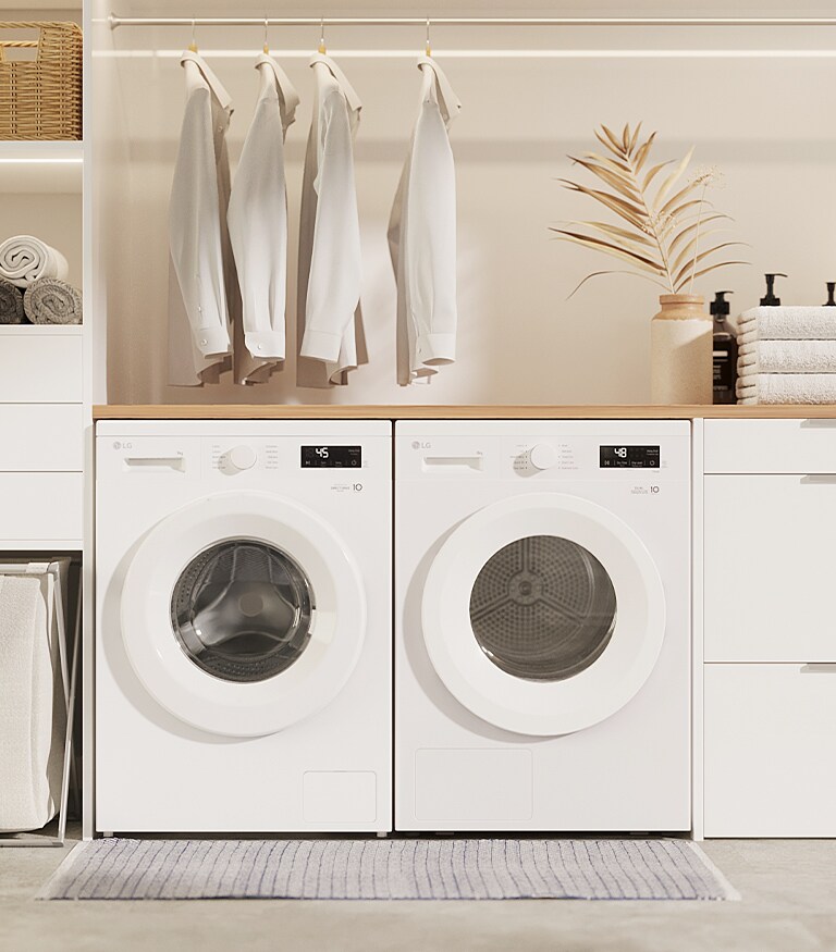 Interior image with a washer and dryer side by side	