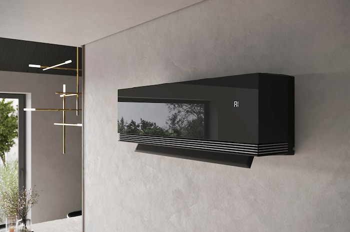 LG ai air conditioner with open vane displaying 18°C