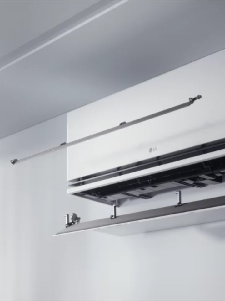 LG airconditioner met dual vane-technologie die de luchtstroom stuurt voor verbeterde koelings- en verwarmings efficiëntie.