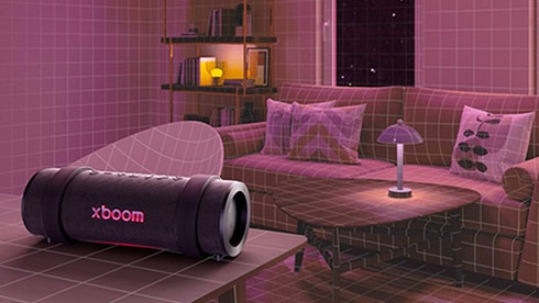 De LG xboom staat op een tafel in de woonkamer, omringd door meubels.