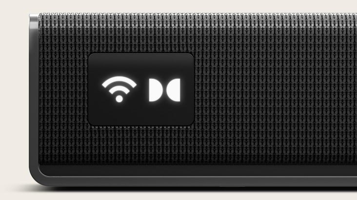 Close-up van de LG Sound Suite H7 Soundbar met een intelligent OLED-display voor bediening, voorzien van Wi-Fi- en Dolby Atmos-pictogrammen.