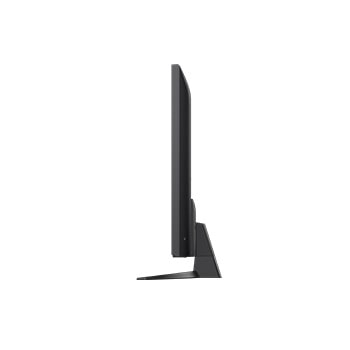 LG TV met een indrukwekkend groot scherm aan de muur boven een LG Soundbar in een moderne woonkamer.