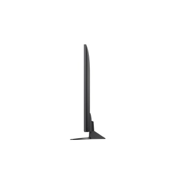 LG TV met een indrukwekkend groot scherm aan de muur boven een LG Soundbar in een moderne woonkamer.