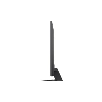 LG TV met een indrukwekkend groot scherm aan de muur boven een LG Soundbar in een moderne woonkamer.