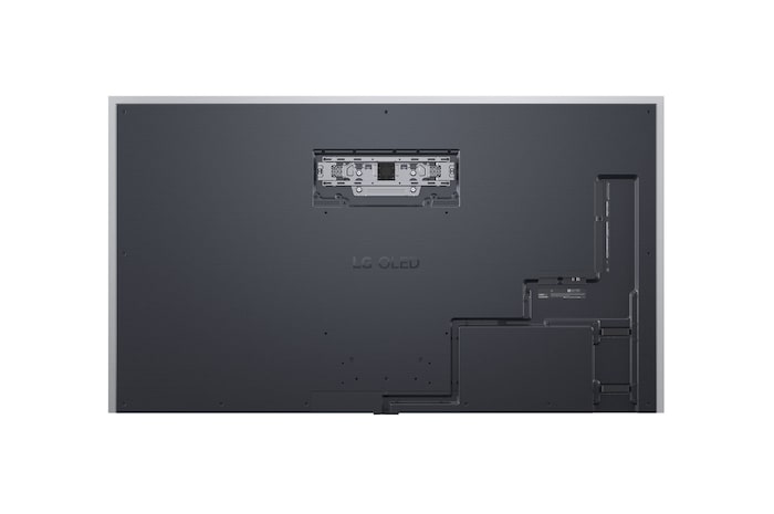 Op een LG OLED TV-scherm is de webOS 25-startpagina gevuld met apps en entertainmentcontent. Bij de tv zit de LG AI Magic Remote, de AI-knop wordt gemarkeerd alsof deze door de stem van de gebruiker wordt geactiveerd. Ernaast staat een tekstballon, die overschakelt naar mijn account. De korte tekst legt uit hoe gebruikers nu hun stem kunnen synchroniseren met hun persoonlijke profiel voor eenvoudiger navigatie en gepersonaliseerde aanbevelingen.