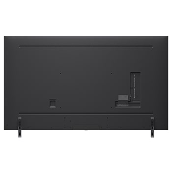 Een meisje en een hond zitten voor een LG QNED TV die aan de muur bevestigd is en waarop drie olifanten te zien zijn die boven een LG Soundbar naar buiten lopen. De titel bespreekt hoe elke actie nog spannender wordt op en gigantisch scherm.