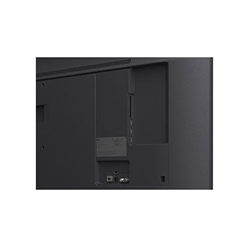 LG TV with an impressively large screen mounted on a wall above a LG Soundbar in a modern style living room.