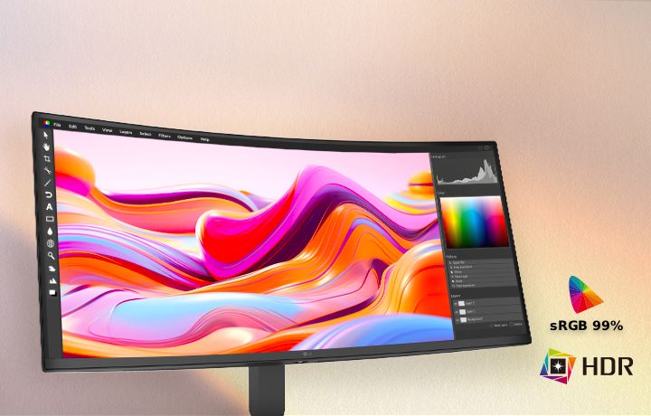 De LG UltraWide Curved Monitor toont levendige, creatieve content op een breed, gebogen scherm met HDR10-ondersteuning en 99% sRGB-kleurdekking. Dit zorgt voor een rijke kleurnauwkeurigheid, verbeterd contrast en precieze visuele details voor creatief werk en een meeslepende kijkervaring.