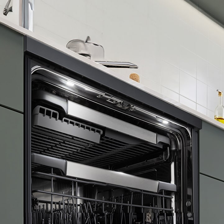 The dishwasher door opens automatically after a wash cycle to release steam, enhancing drying performance.