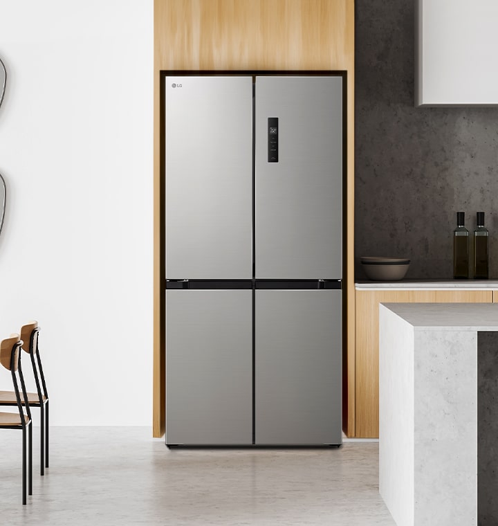 LG French Door Fridge in Silver installed in a cavity in a modern kitchen setting with grey kitchen island.