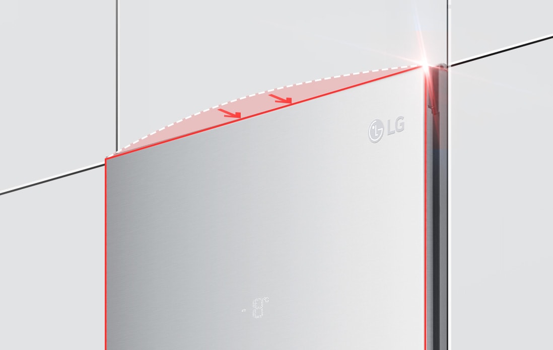 The top of the freezer is shown at an angle with two arrows pointing in toward the wall to indicate it is flush with the cabinets surrounding it.