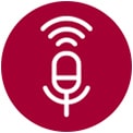 A woman sits in a window holding a drink. She speaks to the AI speaker show by a line from her to the speaker and a sound wave next to her face. The AI speaker then connects to the washer shown with a line and sound waves.	